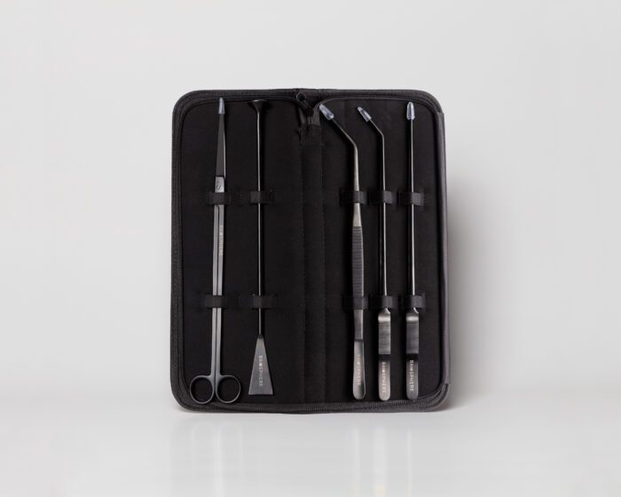 Scaping tools set in black with leather look case